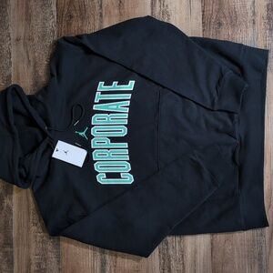 *NWT* Jordan x CORPORATE Hoodie Size Large In Black With Teal Spellout